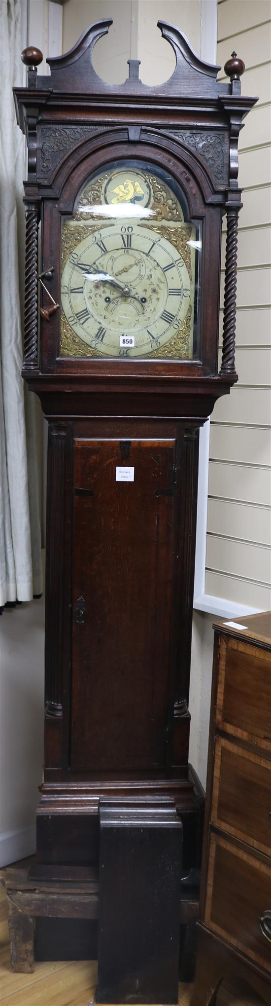 A late 18th century oak and mahogany eight day longcase clock, with painted arched and gilt brass dial